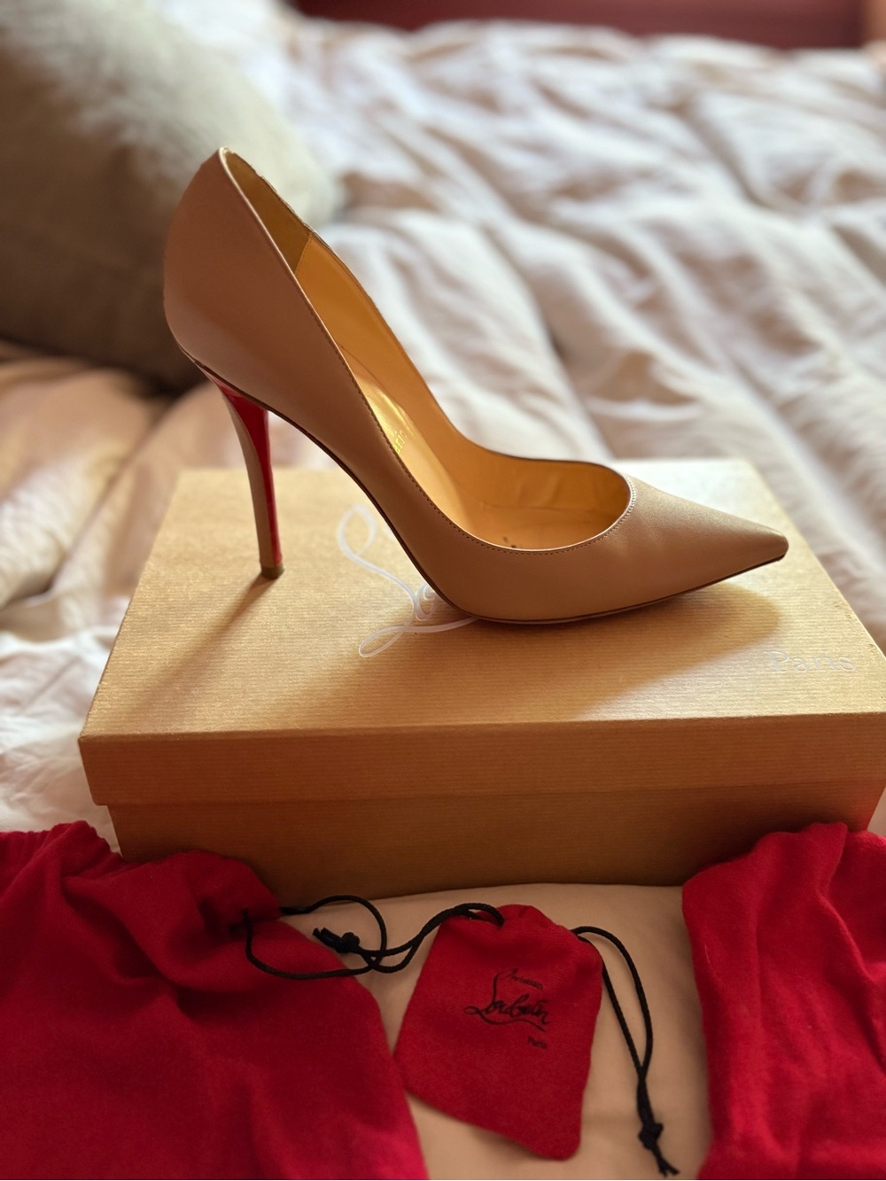Christian Louboutin Beige Pointed Toe Pump with Red Sole